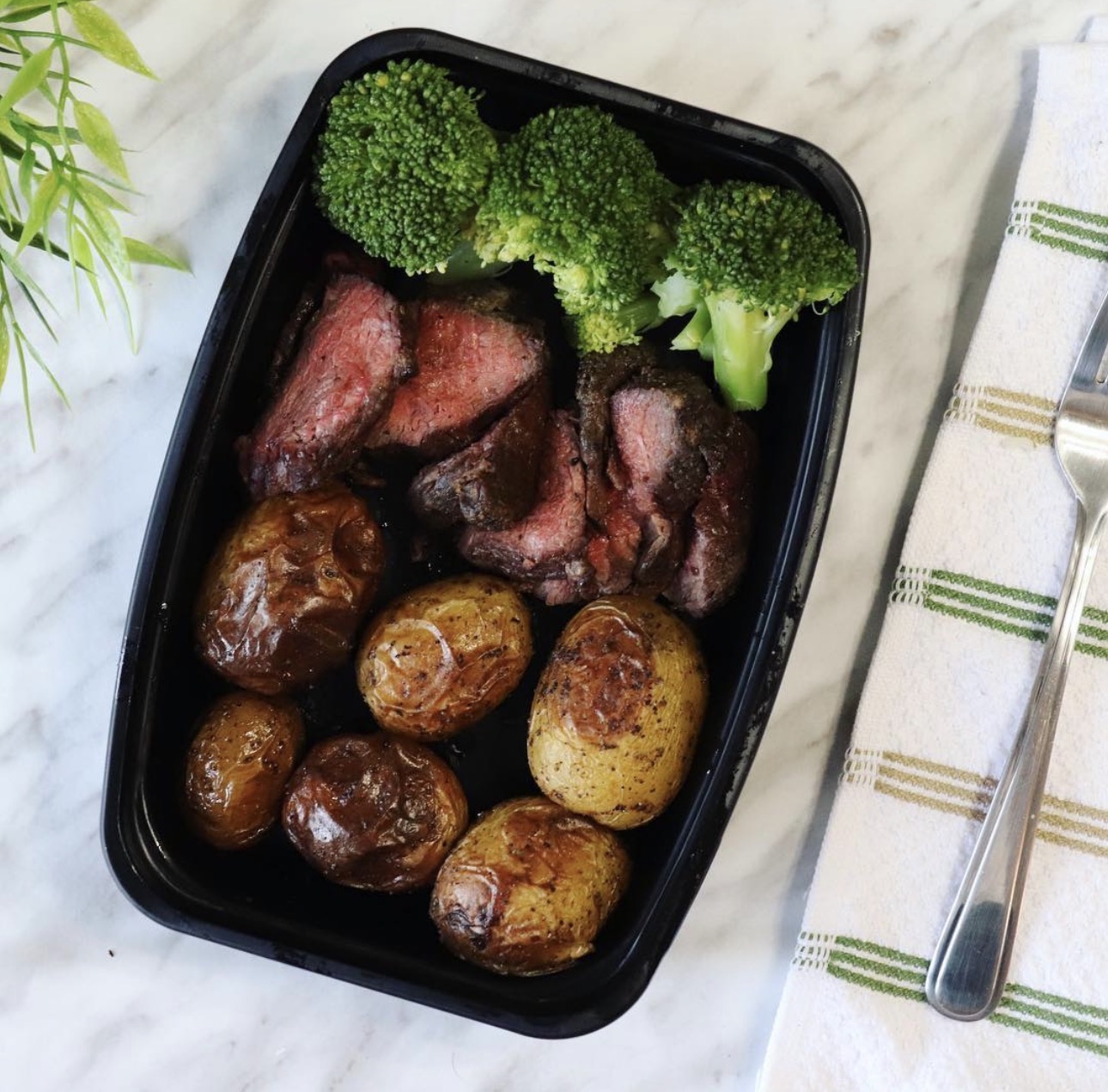 AAA filet mignon with roasted potatoes and broccoli