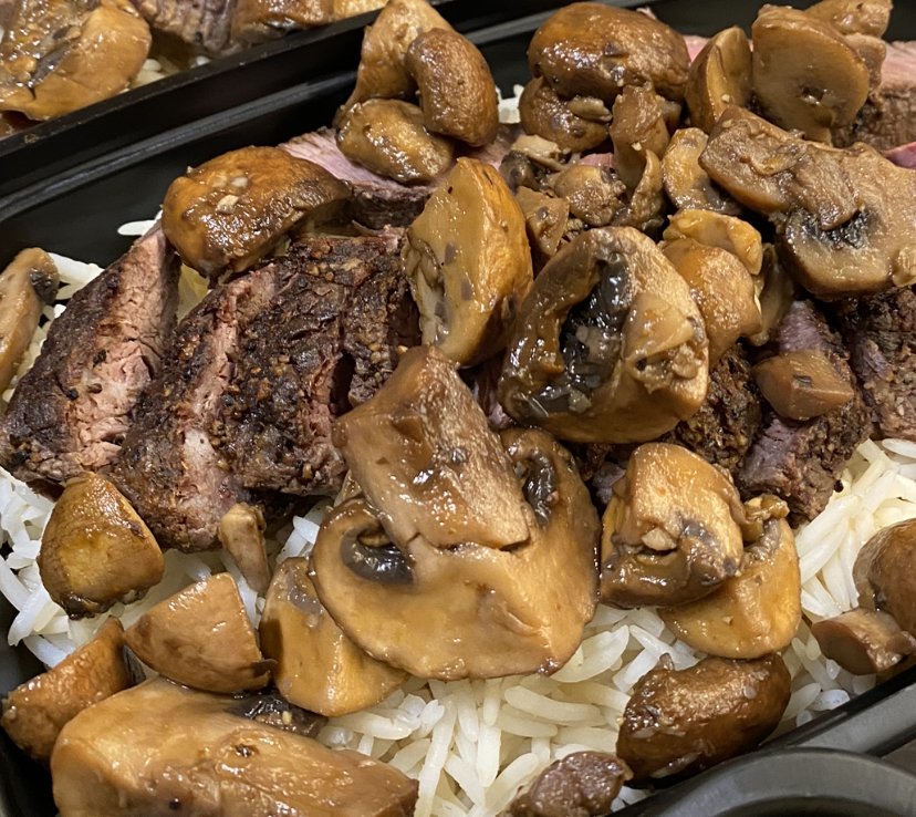 AAA grilled steak with oyster mushrooms over rice